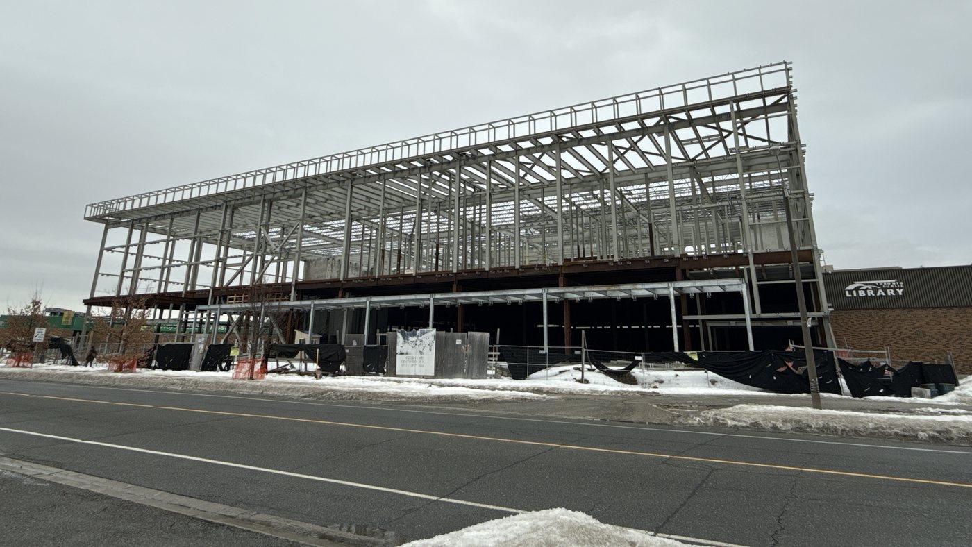 Multi-level structural steel frame of a cinema building under construction in Toronto.